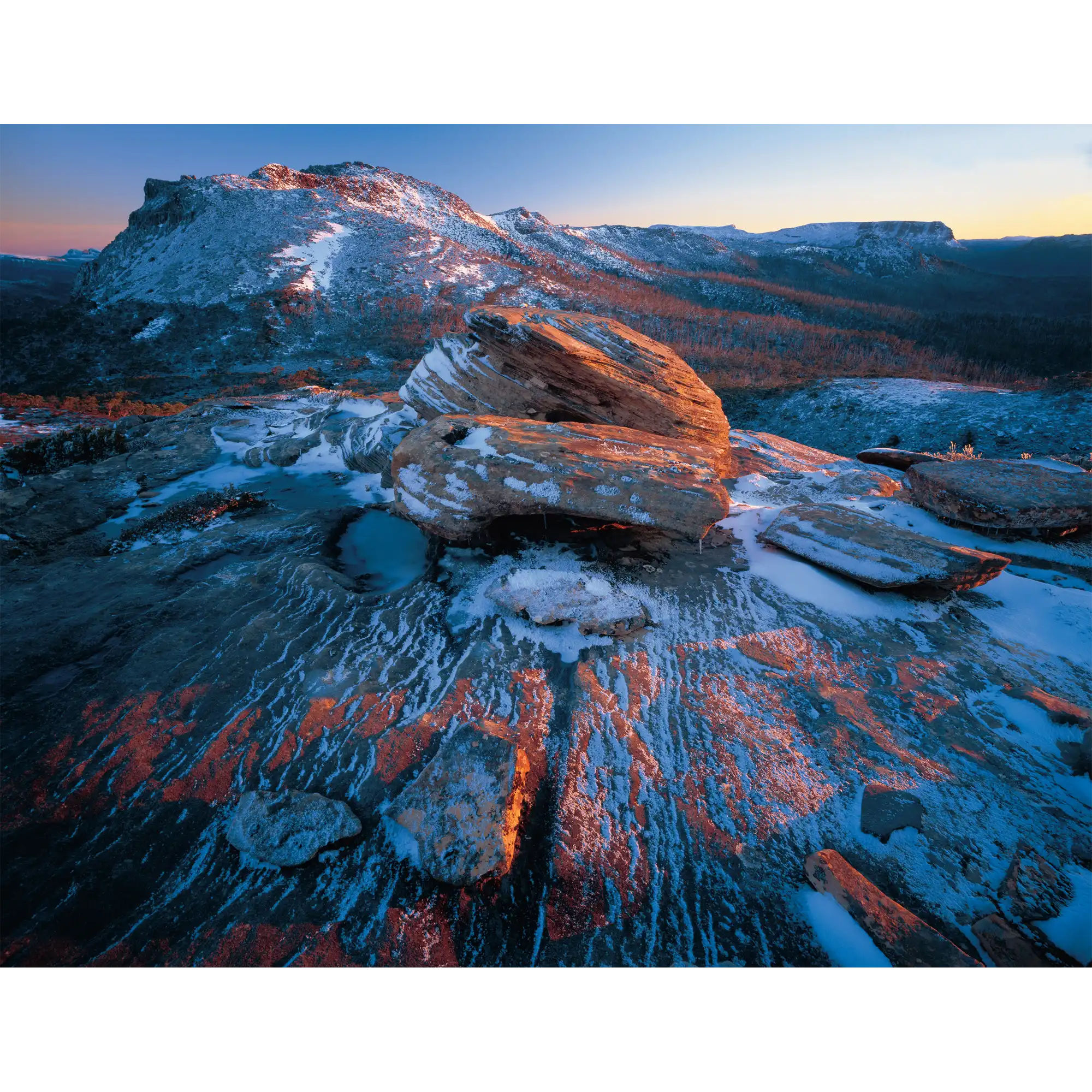 Snow on sandstone-Tasmania by Rob Blakers