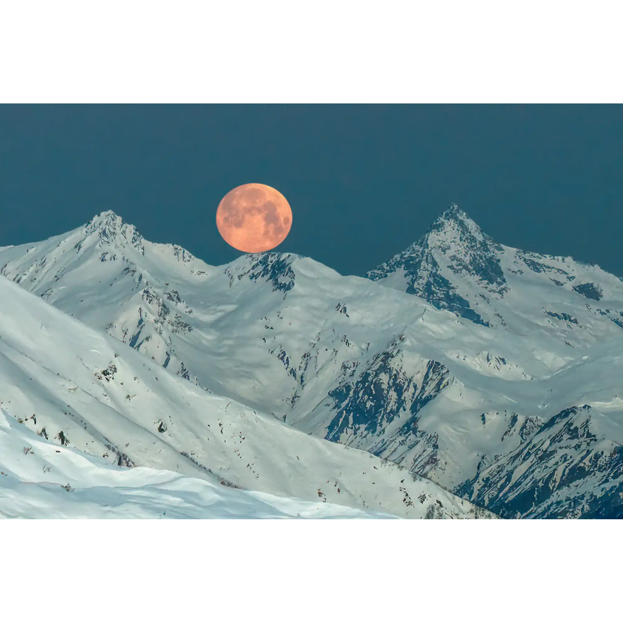 Full moon setting over peaks of the Greater Caucasus Range by Martin Hawes