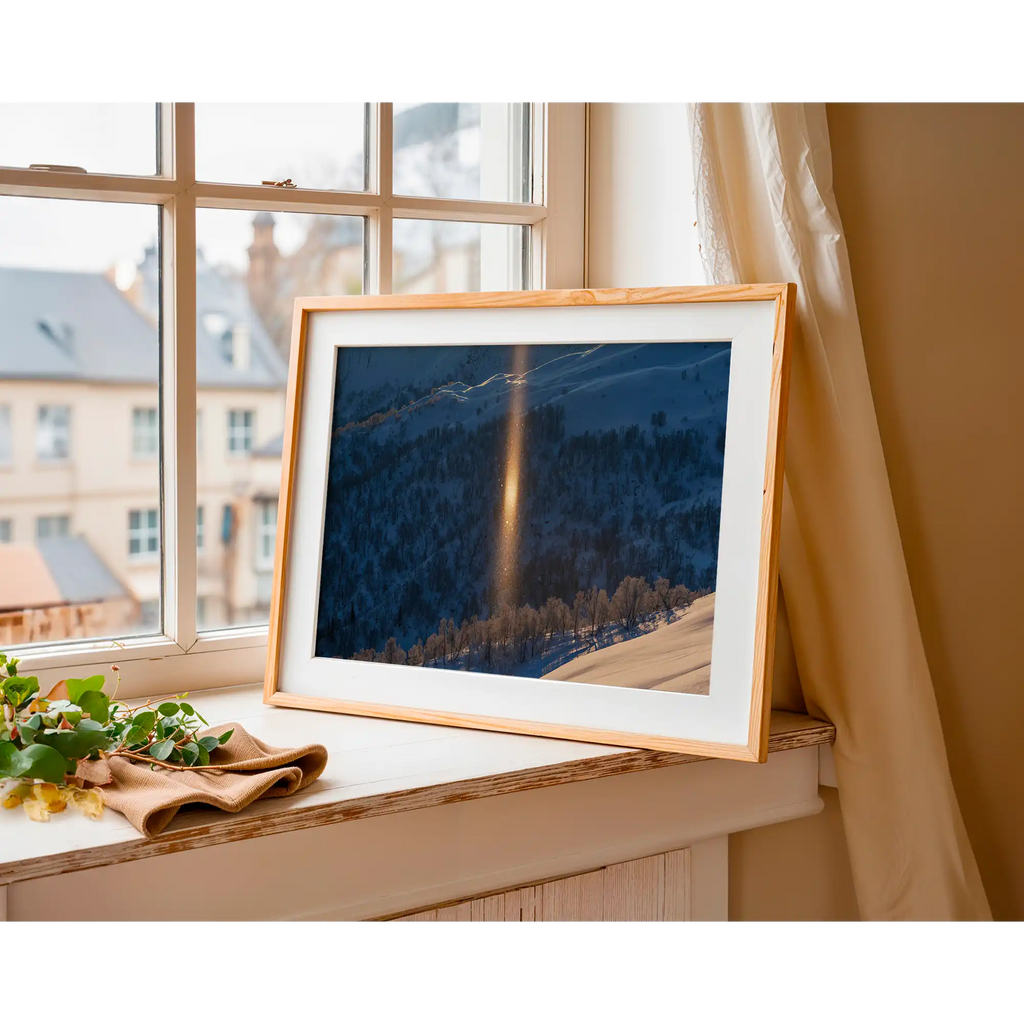 Winter sunlight reflecting off falling ice flakes by Martin Hawes